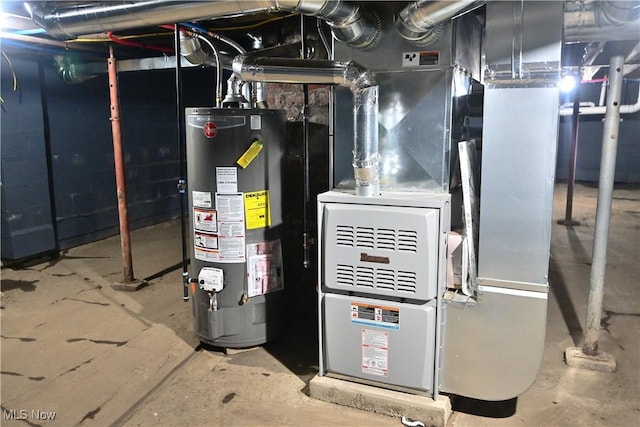 utility room featuring heating unit and water heater