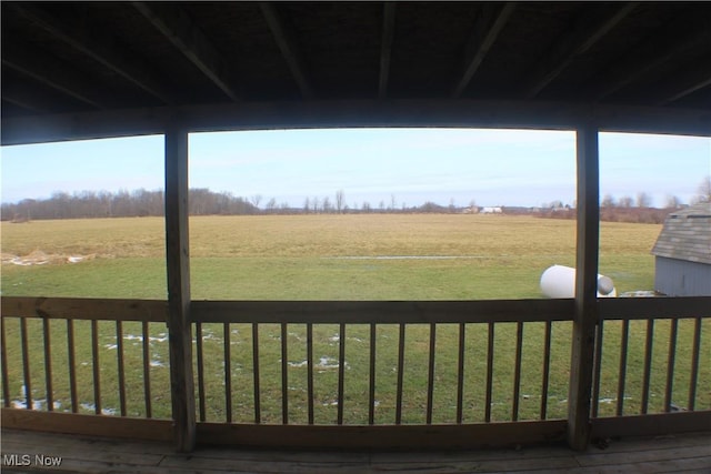 view of yard with a rural view