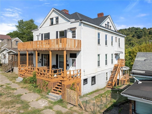 exterior space featuring a wooden deck