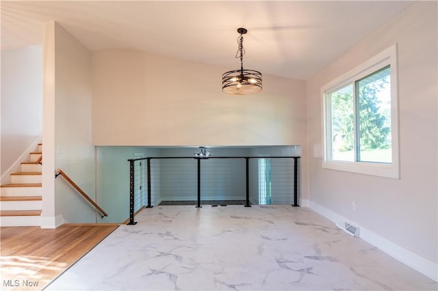 entrance foyer with a notable chandelier