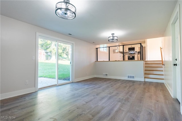 interior space with hardwood / wood-style flooring