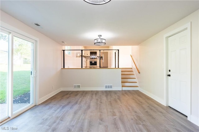 interior space with light hardwood / wood-style floors