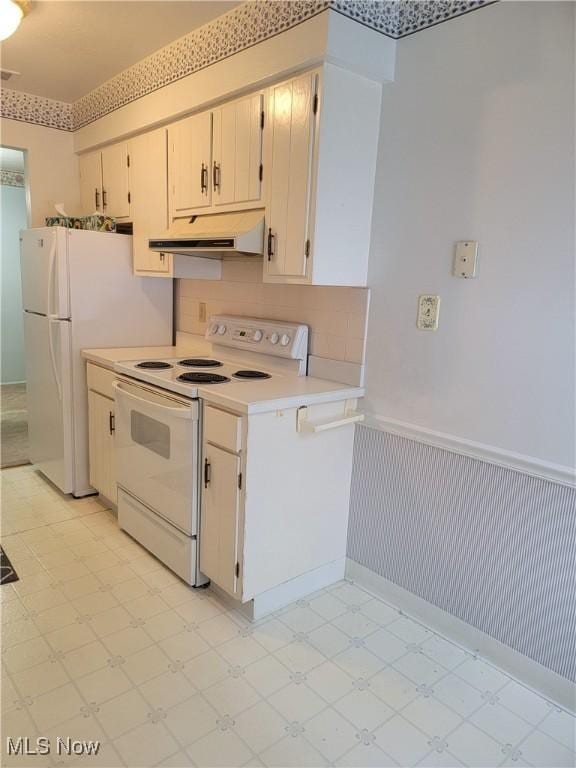 kitchen featuring white electric range