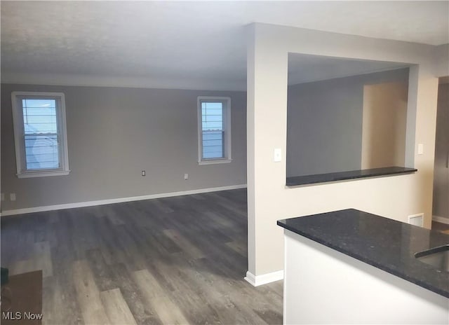 interior space with dark hardwood / wood-style floors