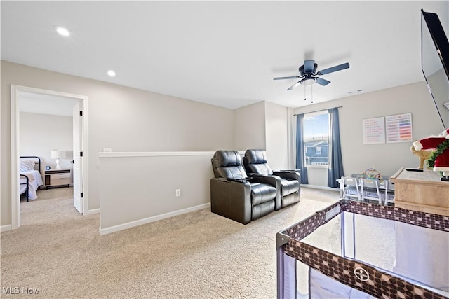 interior space featuring ceiling fan and light colored carpet