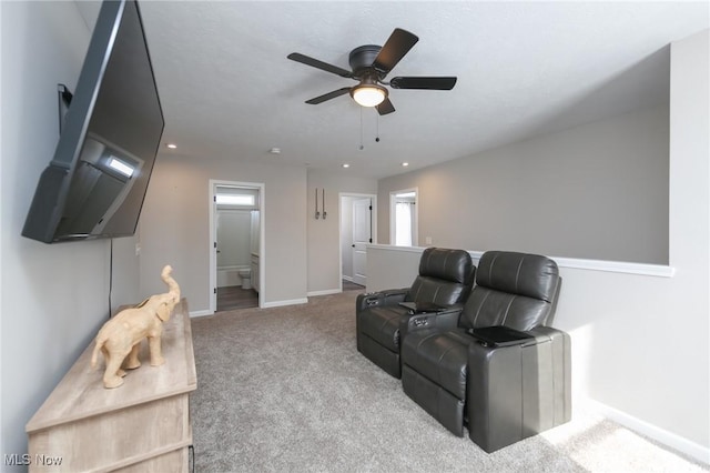 living room featuring carpet flooring, baseboards, ceiling fan, and recessed lighting