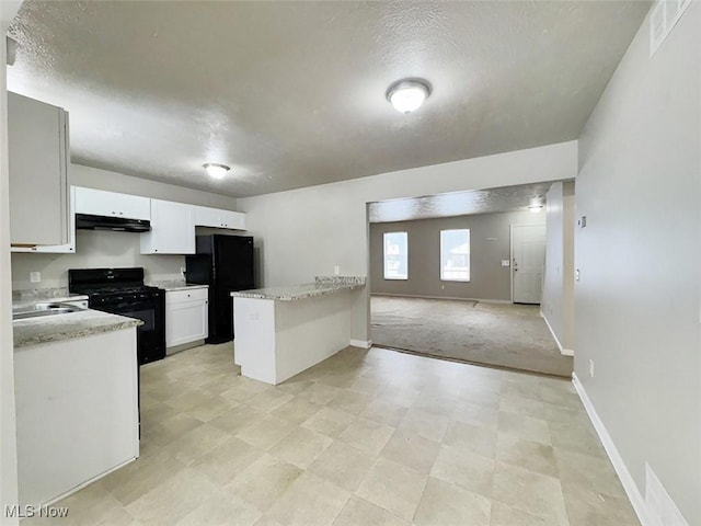 kitchen with light carpet, black appliances, white cabinetry, light stone counters, and kitchen peninsula