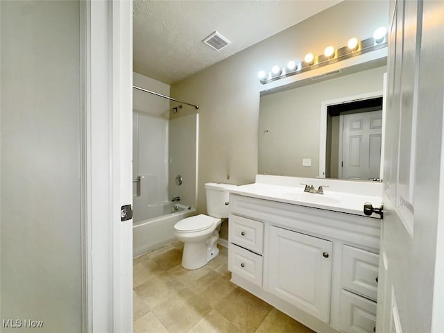 full bathroom with shower / tub combination, vanity, a textured ceiling, and toilet