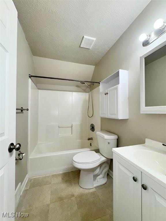 full bathroom with vanity, vaulted ceiling, toilet, a textured ceiling, and tub / shower combination