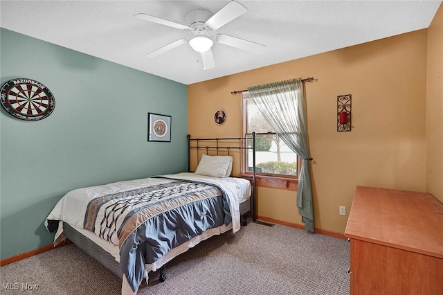 bedroom with light carpet and ceiling fan