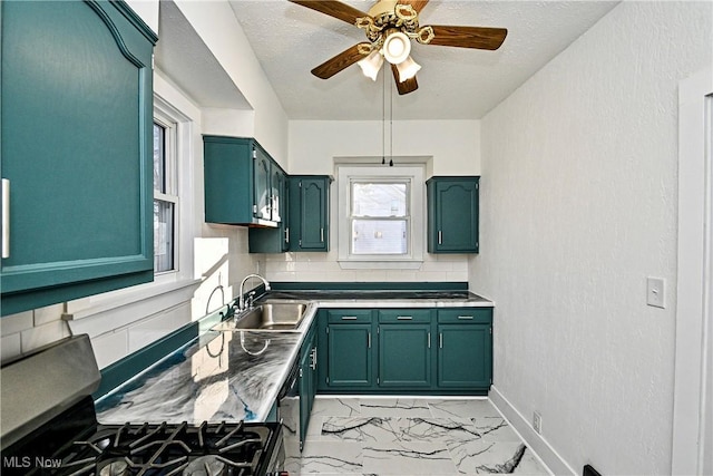 kitchen with stove, sink, ceiling fan, a textured ceiling, and tasteful backsplash