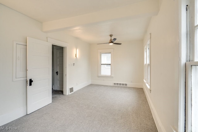 spare room with ceiling fan and carpet floors