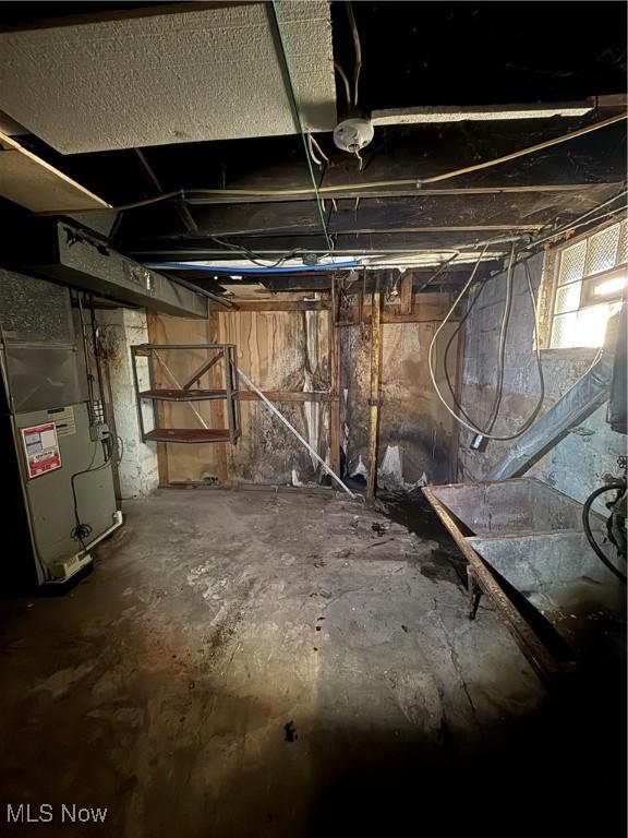 basement with heating unit