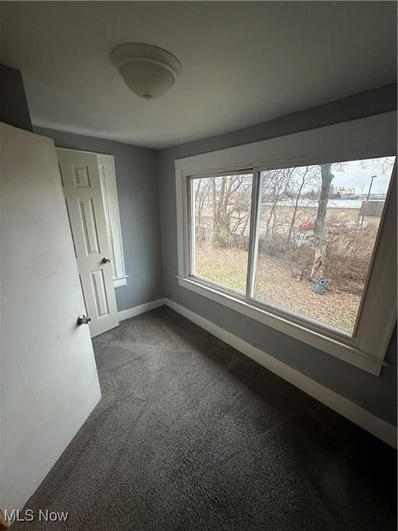 view of carpeted spare room