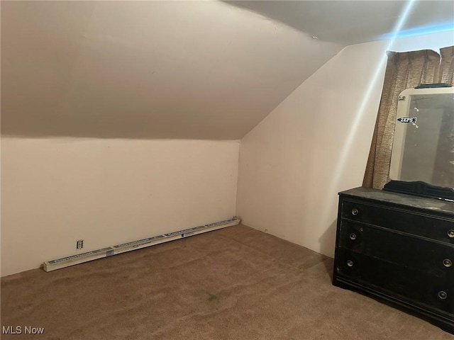 bonus room with carpet flooring, lofted ceiling, and a baseboard heating unit