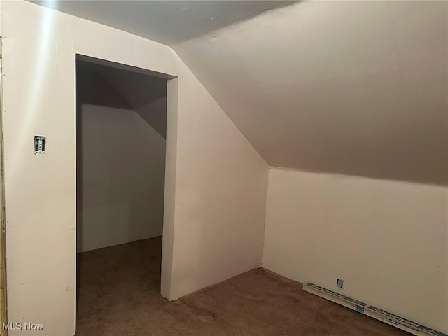 bonus room featuring carpet flooring, a baseboard radiator, and vaulted ceiling