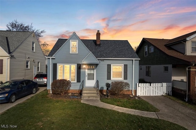 view of front of home featuring a yard