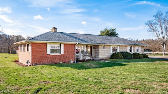 single story home with a front yard