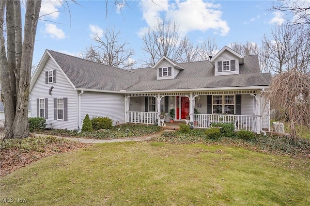 cape cod house with a porch and a front lawn