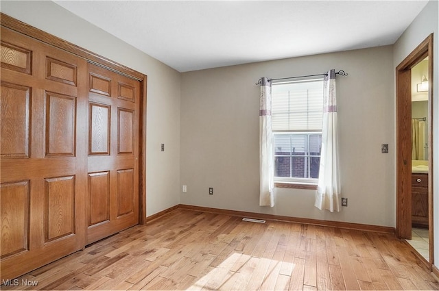 entrance foyer with light wood-type flooring