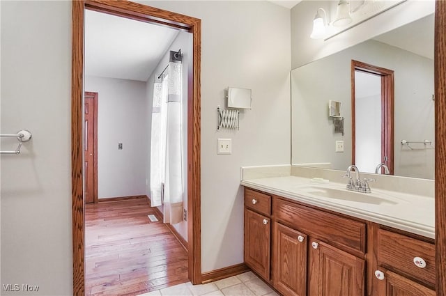 bathroom featuring vanity and tile patterned floors