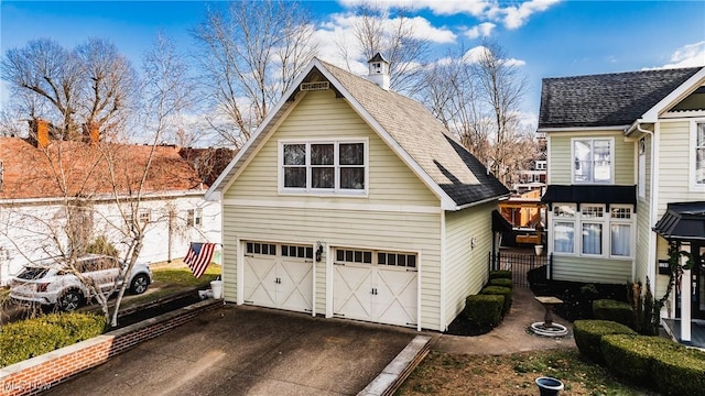 exterior space with a garage