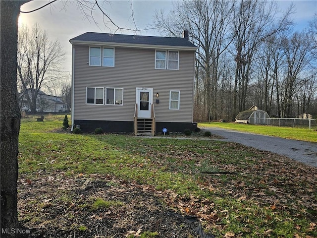 view of front of house with a front yard