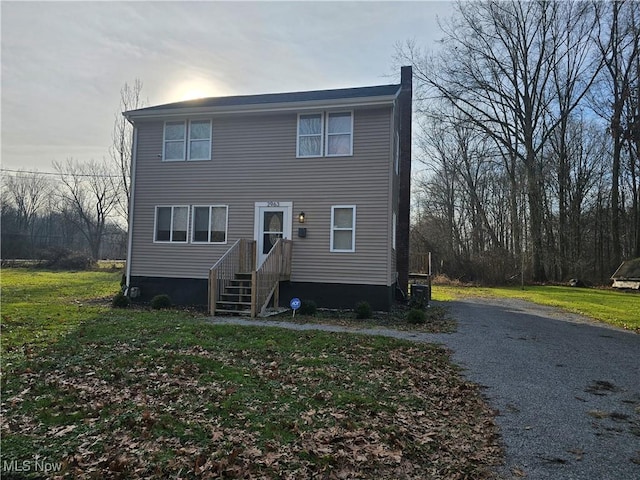 view of front of house with a front yard