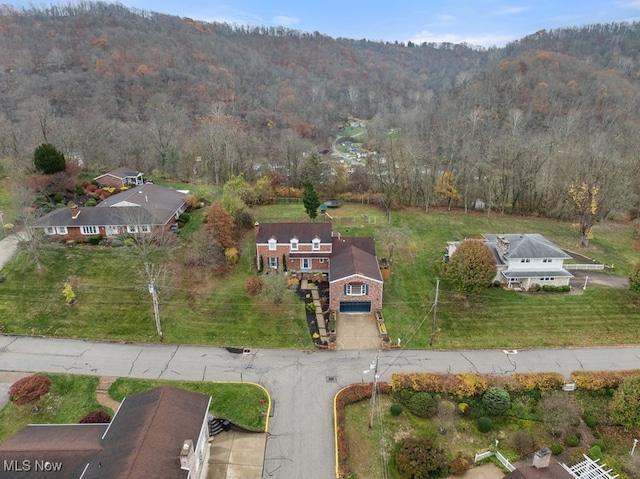 bird's eye view featuring a forest view