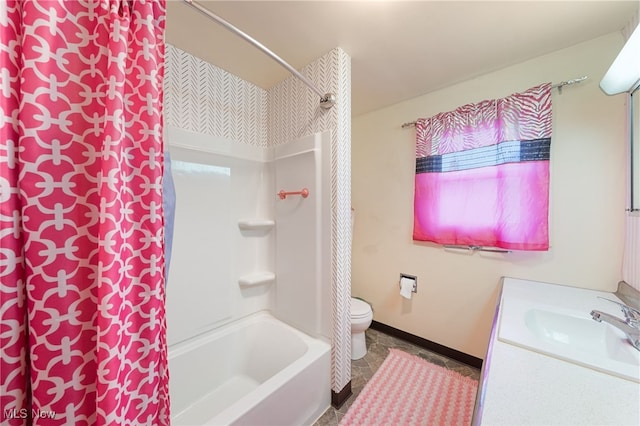 full bathroom featuring tile patterned flooring, vanity, toilet, and shower / bath combo with shower curtain