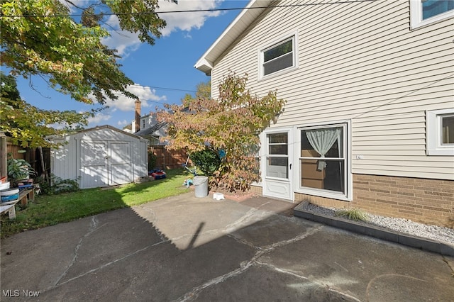 view of patio / terrace featuring a shed