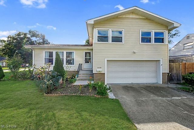 view of front facade featuring a garage and a front yard