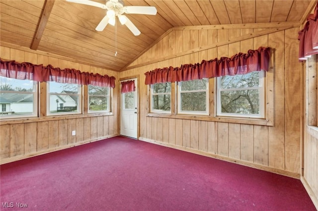 unfurnished sunroom with ceiling fan, lofted ceiling, and wood ceiling