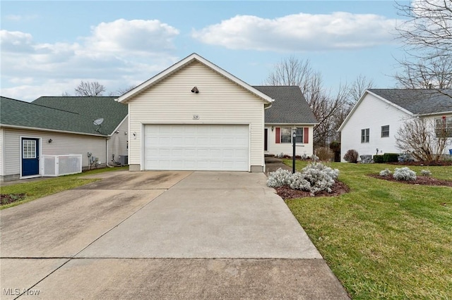 view of front facade featuring a garage and a front lawn