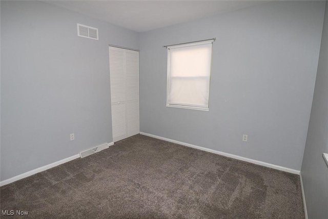 spare room with carpet flooring