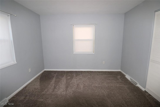 spare room with carpet flooring