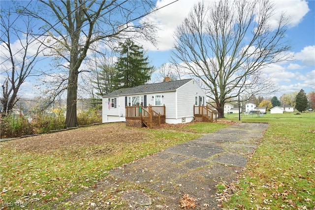 exterior space with a lawn and a garage