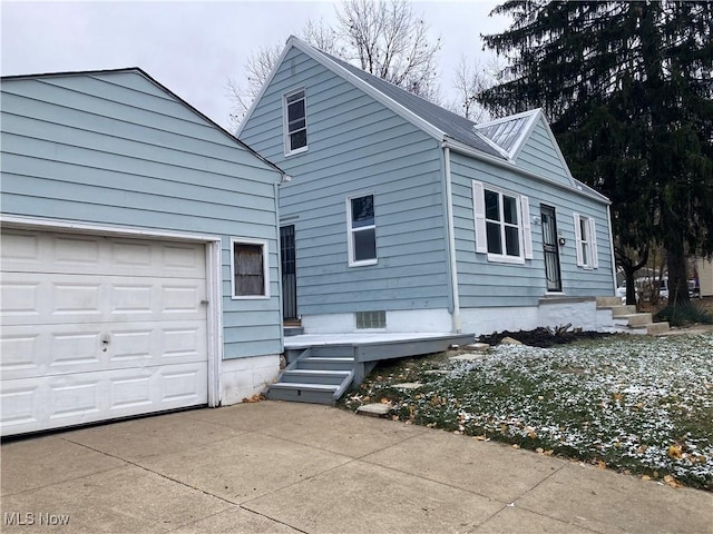 exterior space with a garage