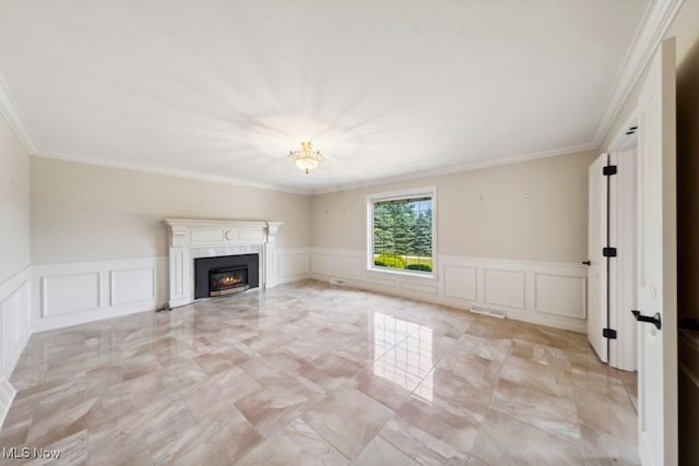 unfurnished living room featuring crown molding