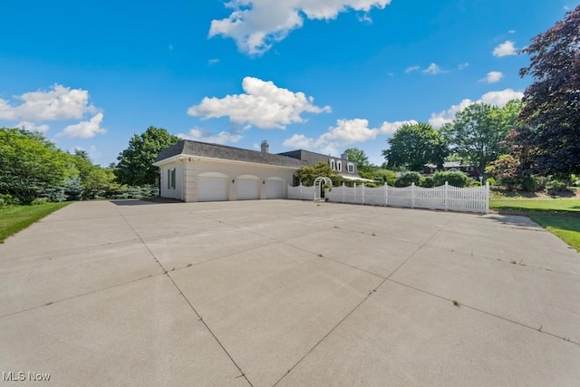 view of home's exterior featuring a garage