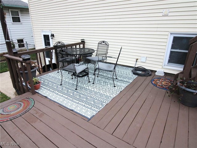 deck featuring outdoor dining space