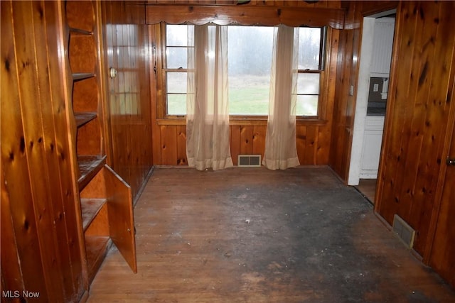 interior space with hardwood / wood-style flooring