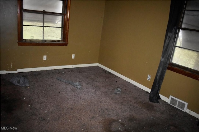 view of carpeted spare room