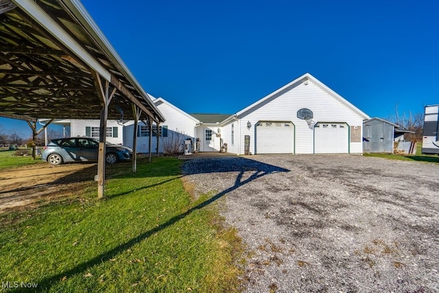 exterior space featuring a garage and a carport