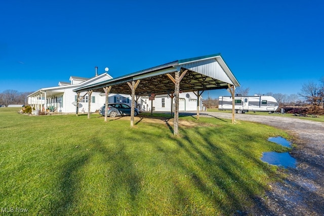 view of yard featuring a carport