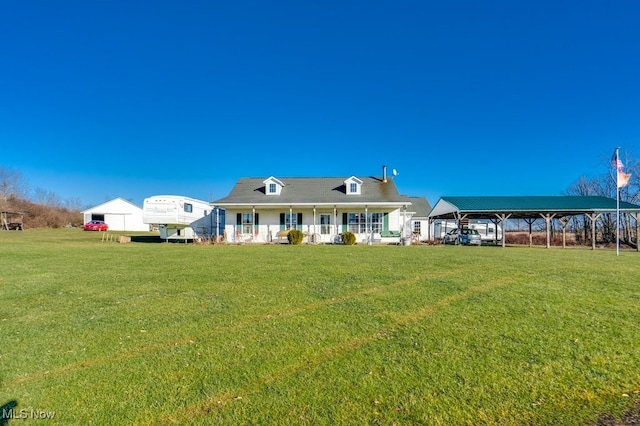 back of property featuring a porch and a yard