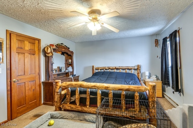 carpeted bedroom featuring ceiling fan, a textured ceiling, and a baseboard heating unit