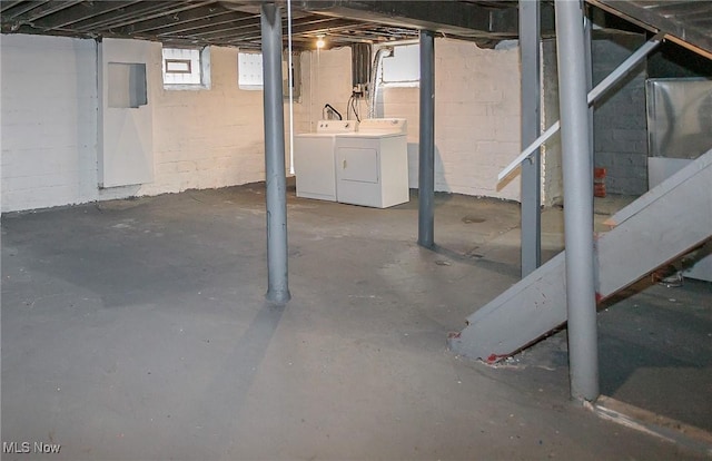 basement with separate washer and dryer