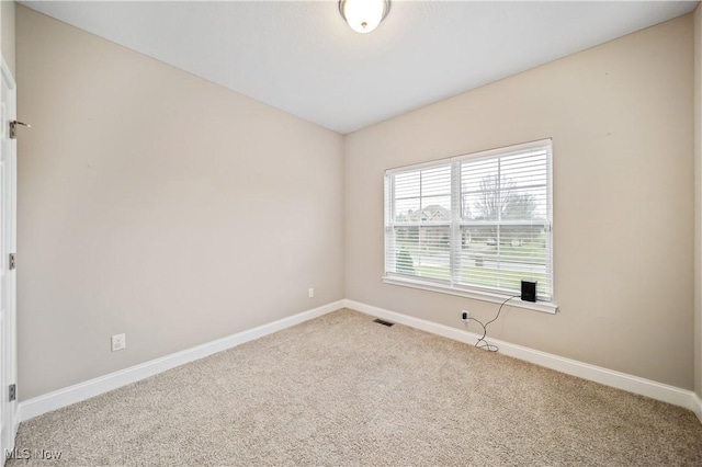 view of carpeted spare room