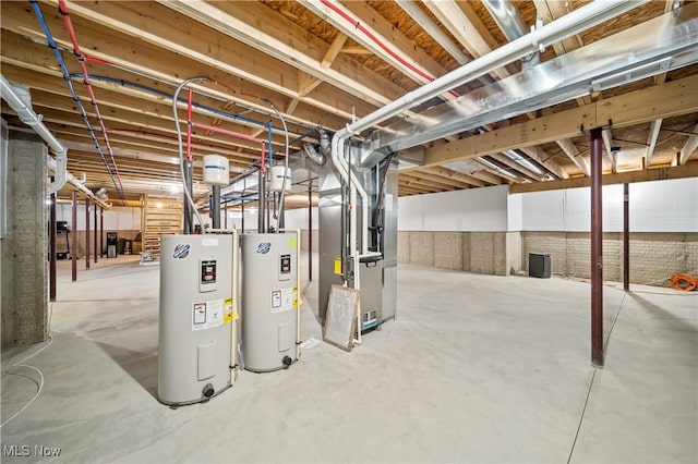 basement featuring electric water heater and heating unit